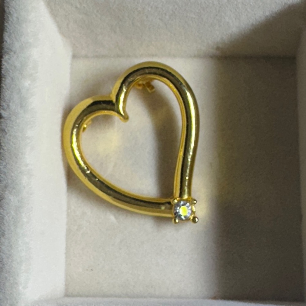 Gold Heart-Shaped Pendant with Gemstone